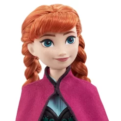 Disney Frozen Core Anna Frozen 1 – ställbar Anna-docka i sin ikoniska resestil med cape, kjol och skor. Perfekt för barn från 3 år att återskapa Frost-äventyr.